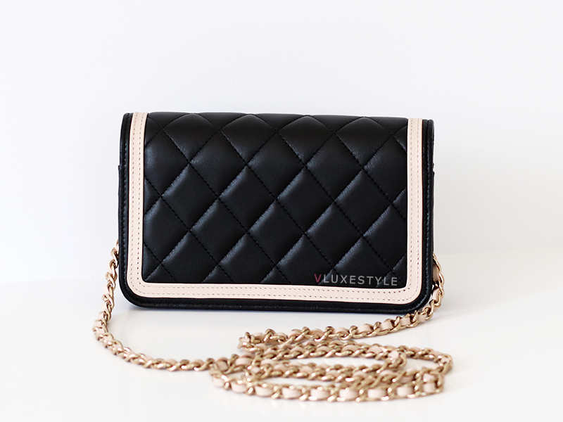 The Chanel 23B Flap Phone Holder with chain