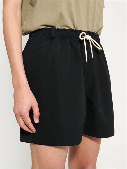 Wool Bermuda shorts AURALEE | A26SP04WCBLACK