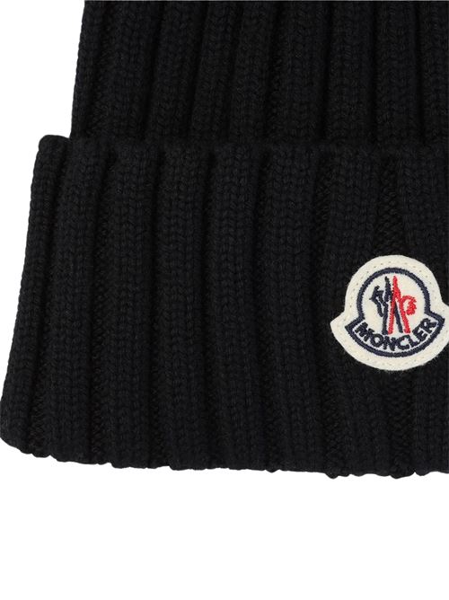Berretto in maglia con pompon MONCLER | L20933B00039M1131999
